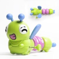 Green and pink wind-up caterpillar toy with blue antennae and a happy face